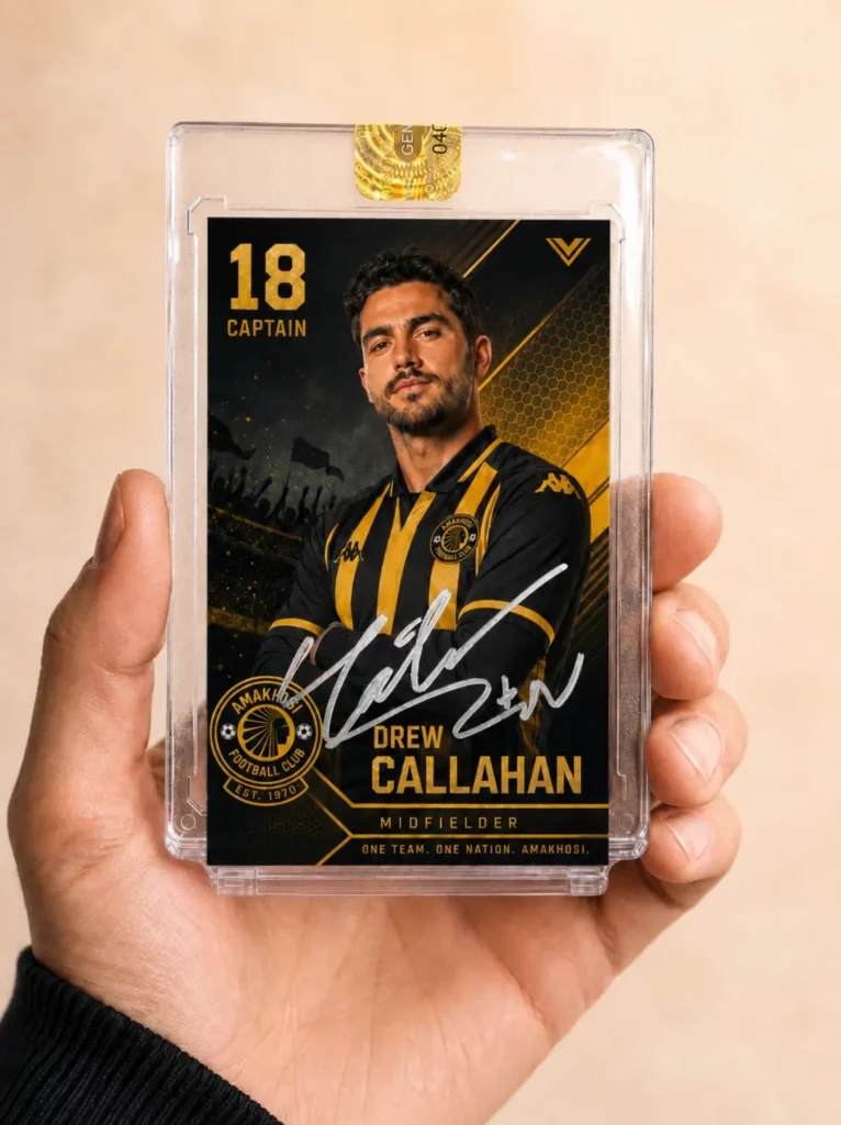 Hand holds a black and gold sports themed trading card in a clear magnetic holder.